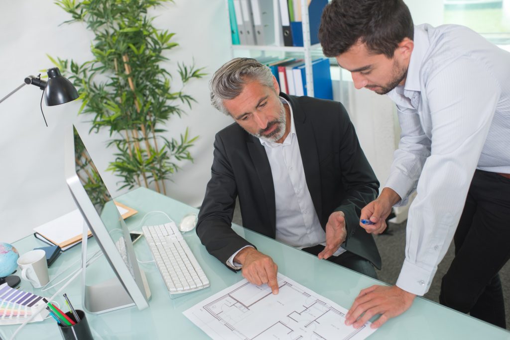 architects discussing on plans